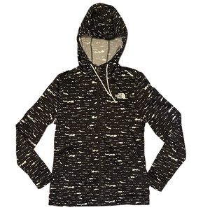The North Face splatter paint pattern zip-up hooded sweatshirt.